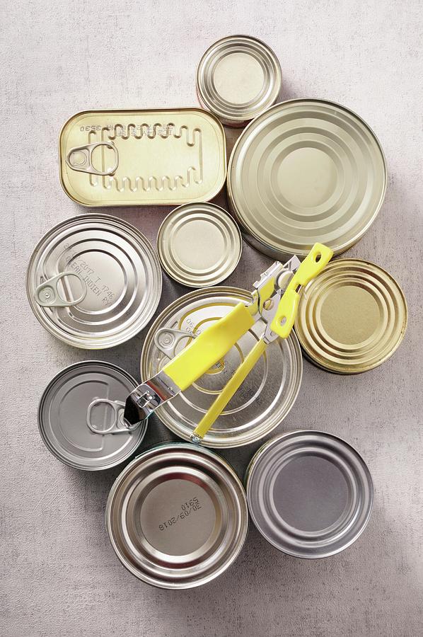 Various Tins Of Food With A Tin Opener seen From Above Photograph by Jean-christophe Riou