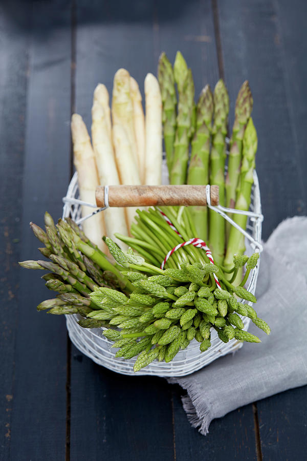 Various Types Of Asparagus In A Wire Basket Photograph by Dirk Przibylla