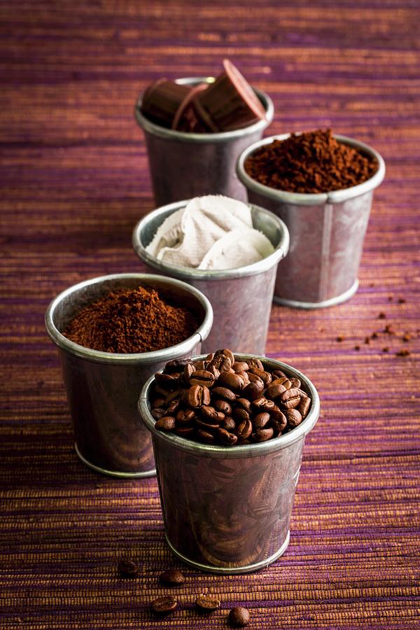 Various Types Of Coffee: Coffee Beans, Powder, Capsules And Sachets In Metal Cups Photograph by Sandra Krimshandl-tauscher
