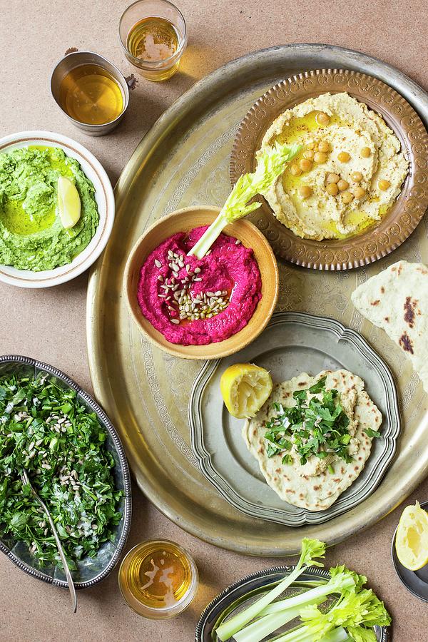 Various Types Of Hummus With Lettuce And Unleavened Bread Photograph by Zuzanna Ploch