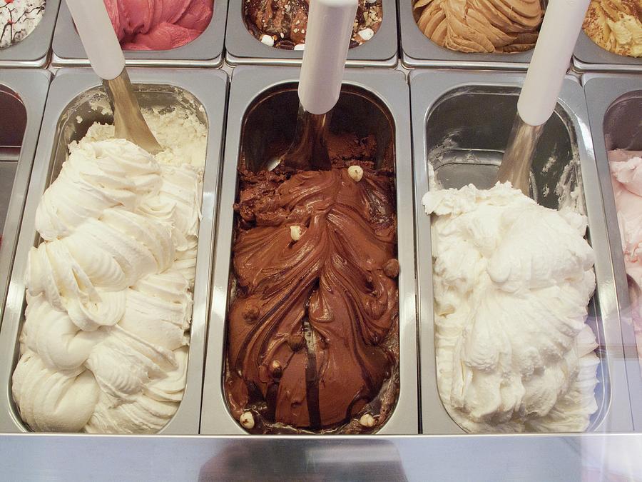 Various Types Of Ice Cream In Metal Containers In An Ice Cream Parlour Photograph by William Boch