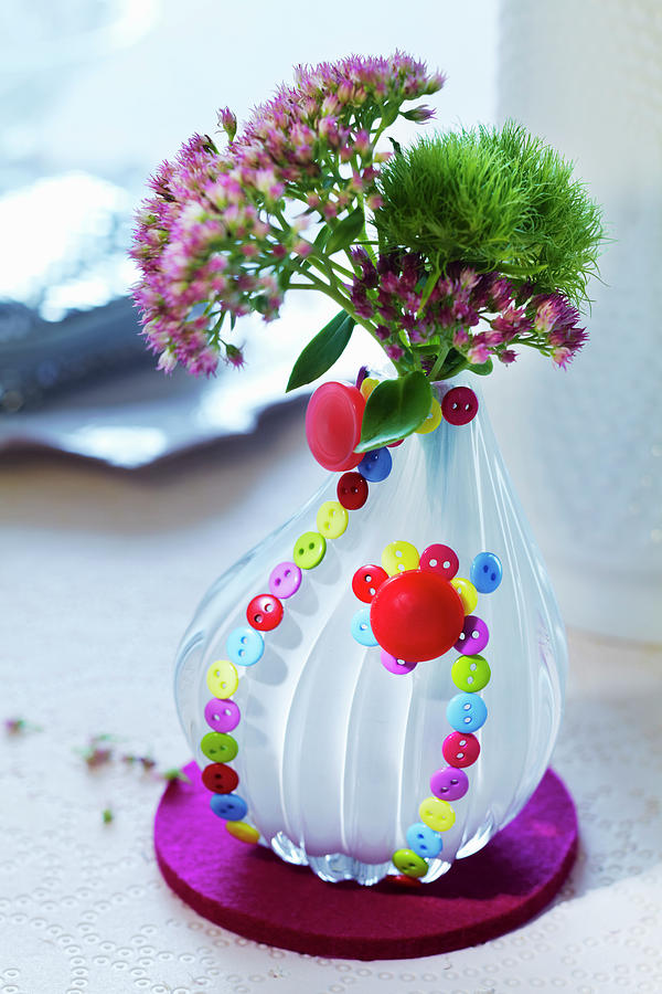 Vase Decorated On Outside With Many Small Buttons Photograph by Franziska Taube