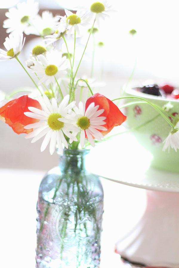Vase Of Fresh Wild Flowers In Front Of Bowl Of Vanilla Custard Photograph by Sylvia E.k Photography