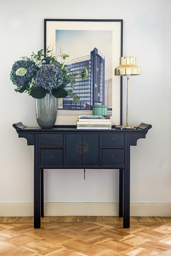 Vase Of Hydrangeas And Picture On Oriental Console Table Photograph by Magdalena Bjrnsdotter