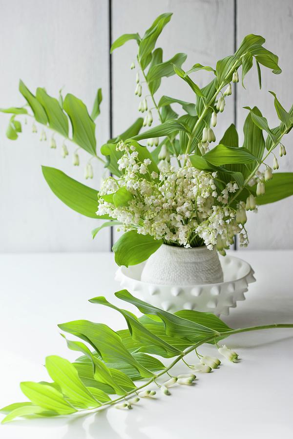 Vase Of Lily Of The Valley And White-flowered Solomons Seal Photograph by Annette Nordstrom