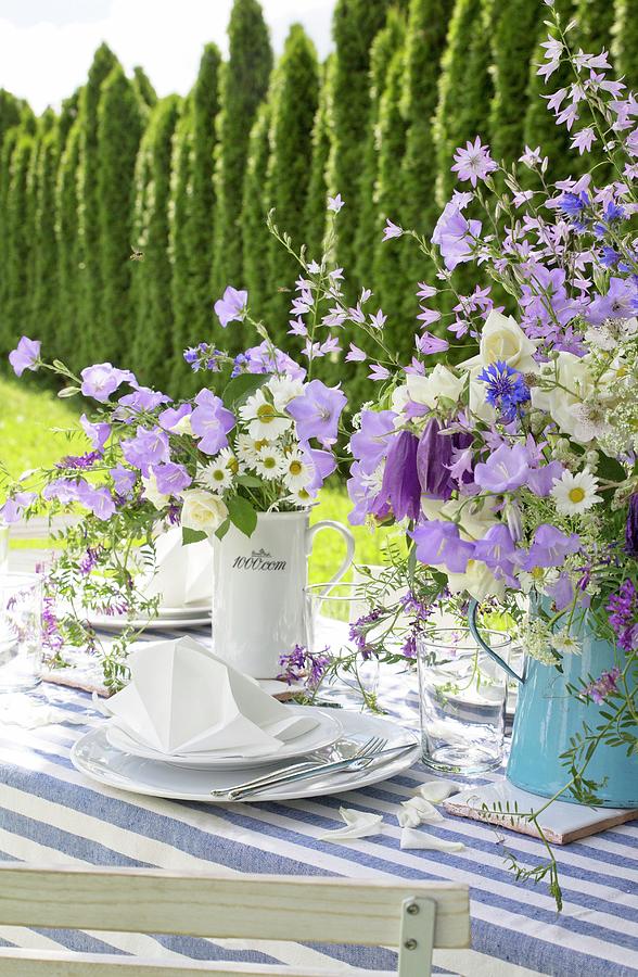 Vases Of Flowers On Garden Table Festively Set In Blue And White Photograph by Angela Francisca Endress