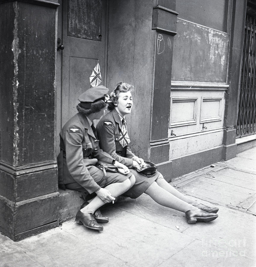Ve Day Resting On A Pavement, 8th May 1945 Photograph by 