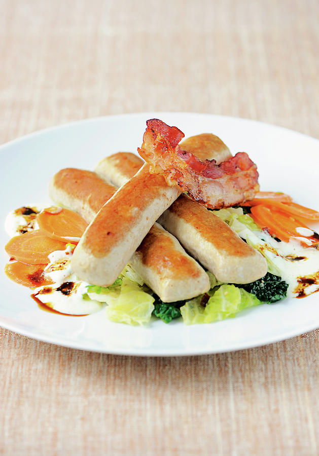 Veal And Pork wollwurst On A Bed Of Creamy Savoy Cabbage With Bacon Photograph by Torri Tre