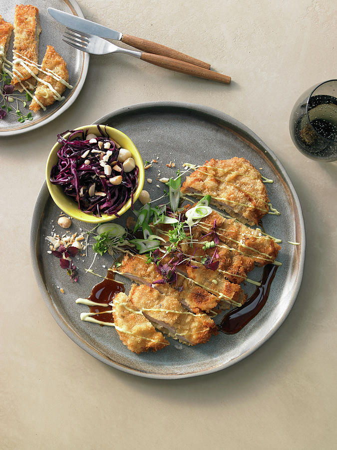 Veal Escalope With Red Cabbage And Macadamia Nut Coleslaw Photograph by Jan-peter Westermann