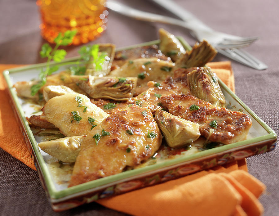 Veal Escalopes With Baby Artichokes Photograph by Bertram