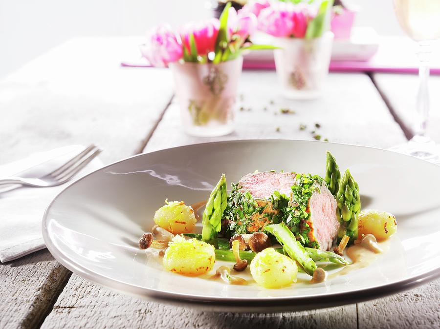 Veal Fillet With Asparagus And Lemon Gnocchi Photograph by Christian Schuster