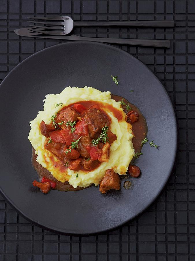 Veal Goulash With Peppers, Chanterelle Mushrooms And Mashed Potatoes Photograph by Jalag / Julia Hoersch