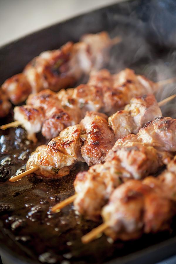 Veal Kebabs Being Fried Photograph by Imagerie