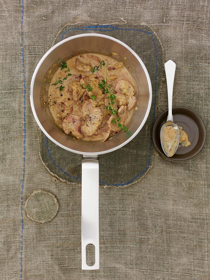 Veal Kidneys In A Mustard Sauce Photograph by Jalag / Wolfgang Schardt