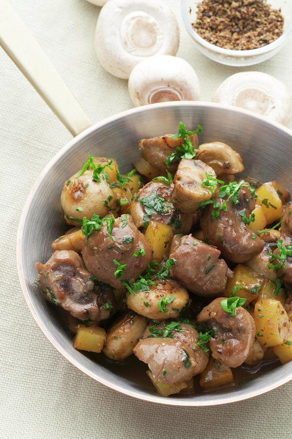 Veal With Fresh Mushrooms And Roast Potatoes Photograph by Food Experts ...