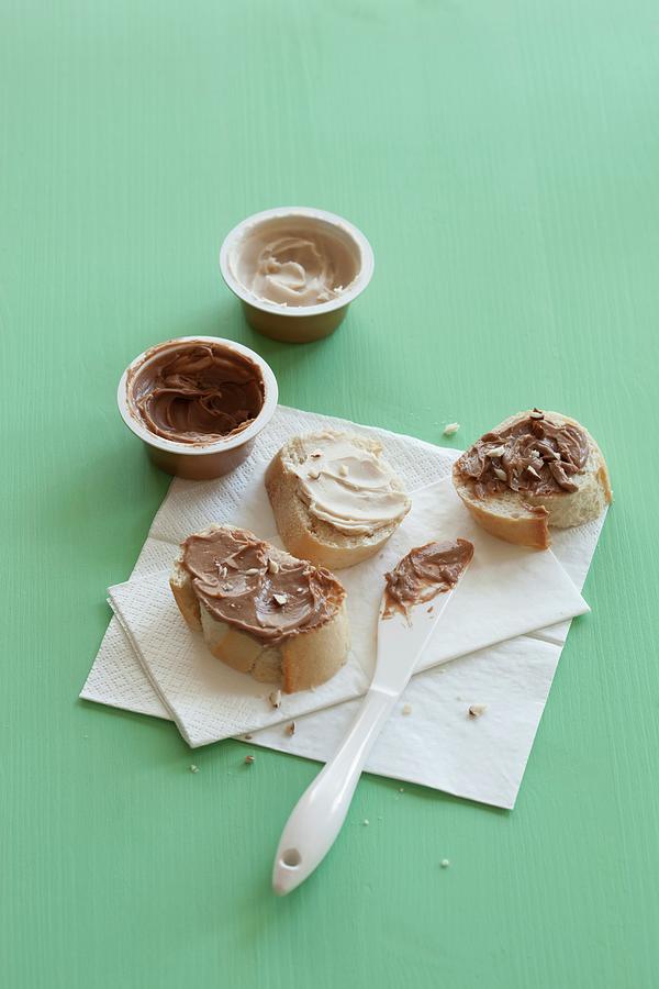 Vegan Almond And Coconut-almond Spreads On Bread And In Tubs Photograph by Olga Miltsova