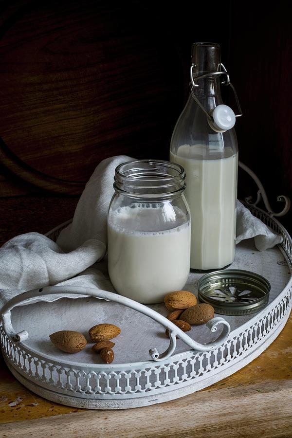 Vegan Almond Milk In A Flip-top Bottle And A Screw-top Jar On A Tray Photograph by Food With A View