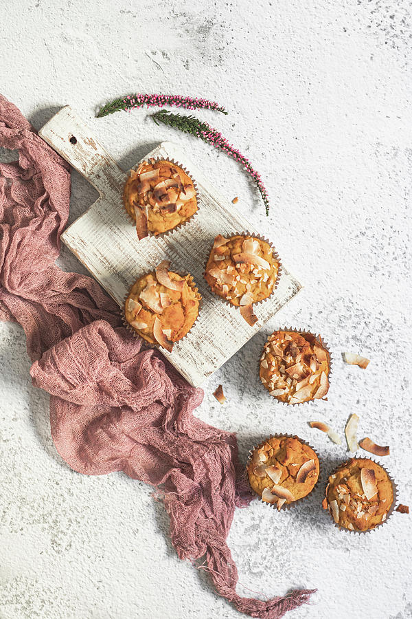 Vegan And Glutenfree Pumpkin Muffins With Coconut Flakes Photograph by Karolina Nicpon