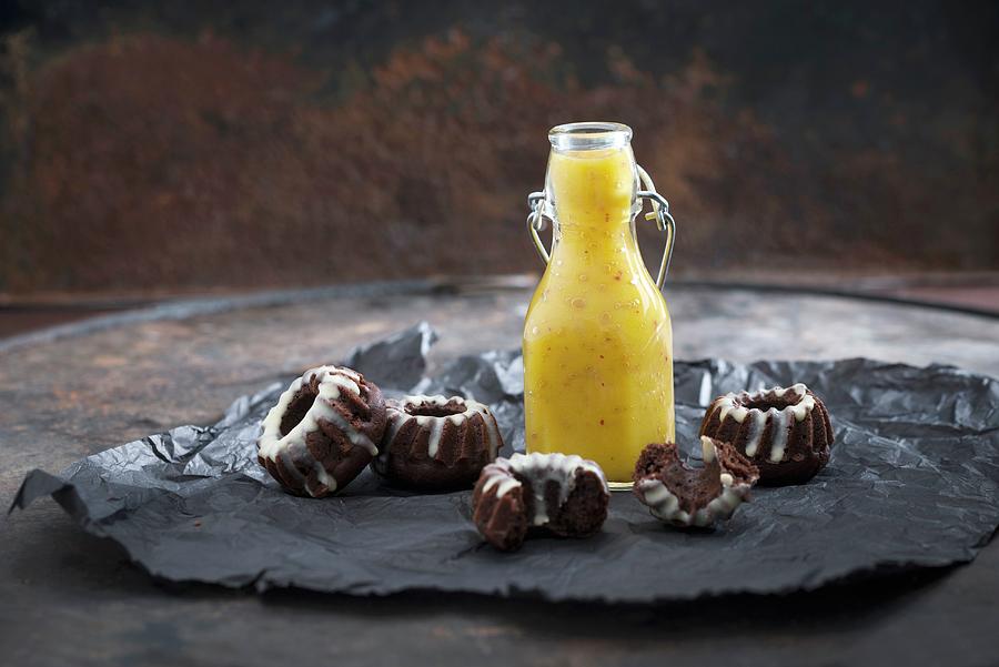 Vegan Apple And Mango Smoothie With Mini Chocolate Cakes Photograph by Kati Neudert