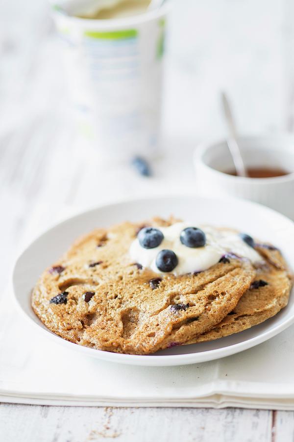 Vegan Blueberry Pancakes With Soya Yoghurt Photograph by Jan Wischnewski