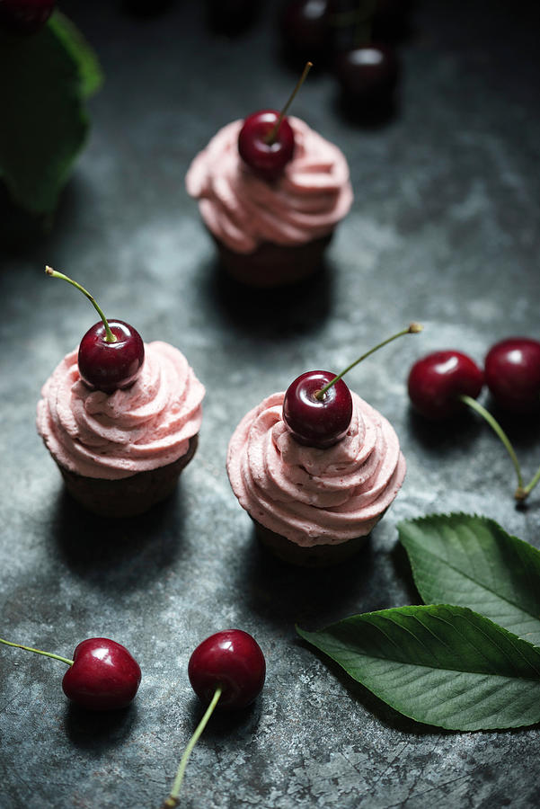 Vegan Chocolate And Hazelnut Cupcakes With Cherry Cream Photograph by Kati Neudert