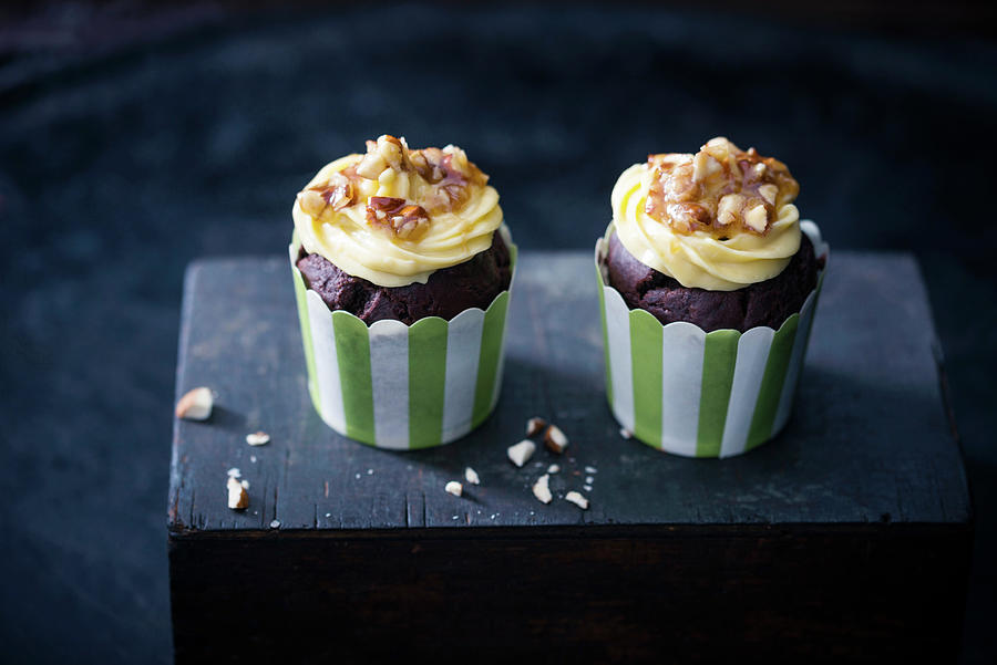 Vegan Chocolate Cupcakes With Vanilla Frosting And Caramelised Almonds Photograph by Kati Neudert
