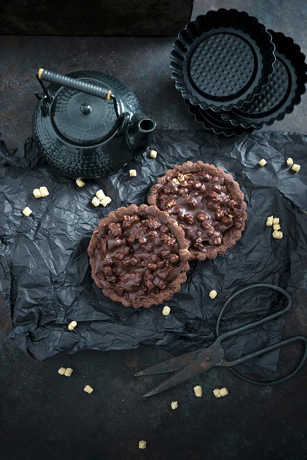 Vegan Chocolate Tartlets With Oat Pops Photograph by Kati Neudert