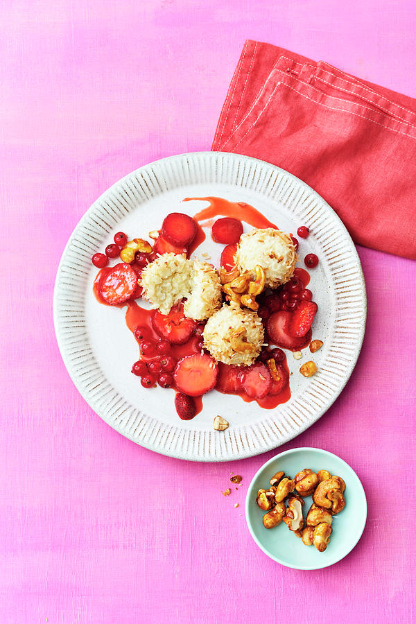 Vegan Coconut Rice Pudding Balls With Berry Sauce And Nuts Photograph by Stockfood Studios / Andrea Thode Photography