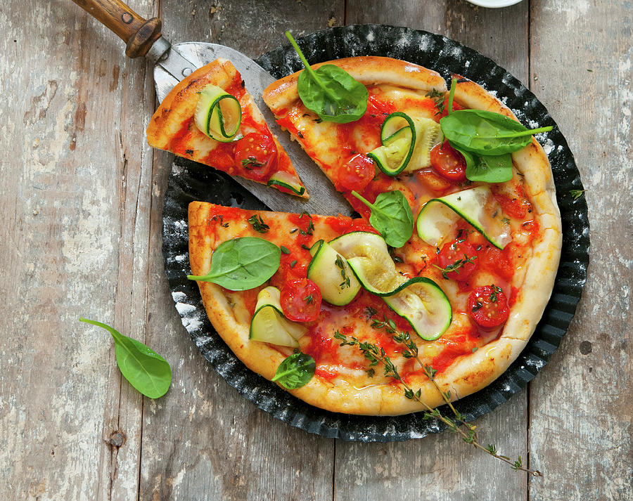 Vegan Courgette And Tomato Pizza Photograph by Udo Einenkel