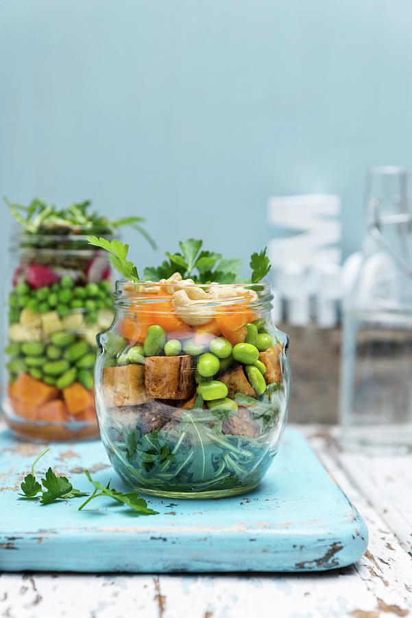 Vegan Crispy Tofu Salad With Vegetables And Cashews In A Glass Jar Photograph by Komar