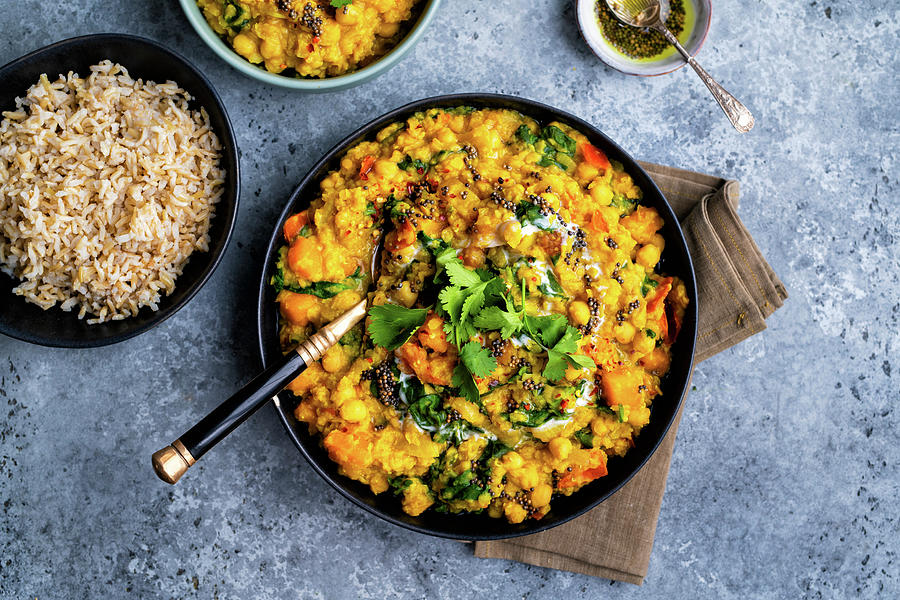Vegan Dal With Red Lentils, Squash, Chickpeas And Spinach In A Bowl With Rice On The Side india Photograph by Lucy Parissi