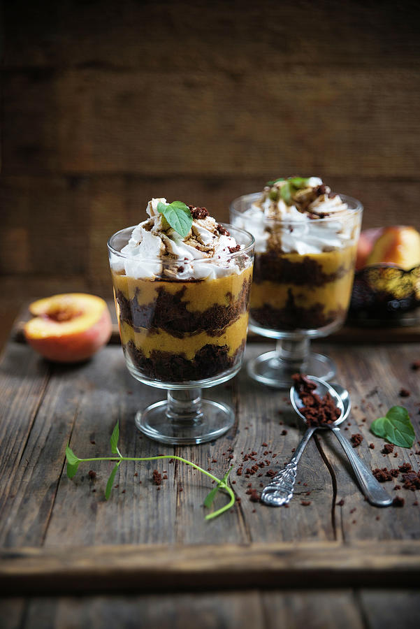 Vegan Dessert Made From Chocolate Cake, Peach Pure, Whipped Soya Cream And Coffee Syrup In Glasses Photograph by Kati Neudert