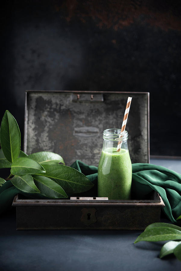 Vegan Green Smoothie With Bananas, Peaches, Broccoli And Spinach Photograph by Kati Neudert