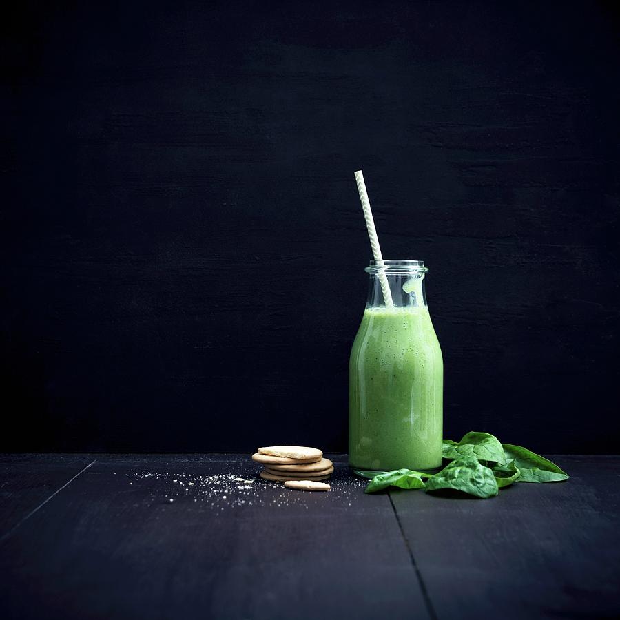 Vegan Green Smoothie With Leaf Spinach In A Glass Bottle Photograph by Kati Neudert
