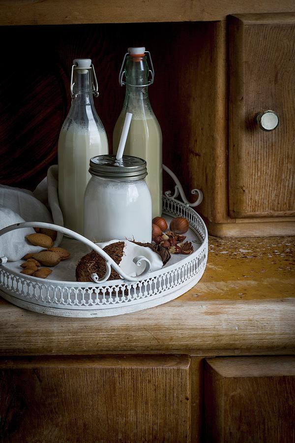 Vegan Hazelnut Milk, Almond Milk And Coconut Milk On A Vintage Tray Photograph by Food With A View