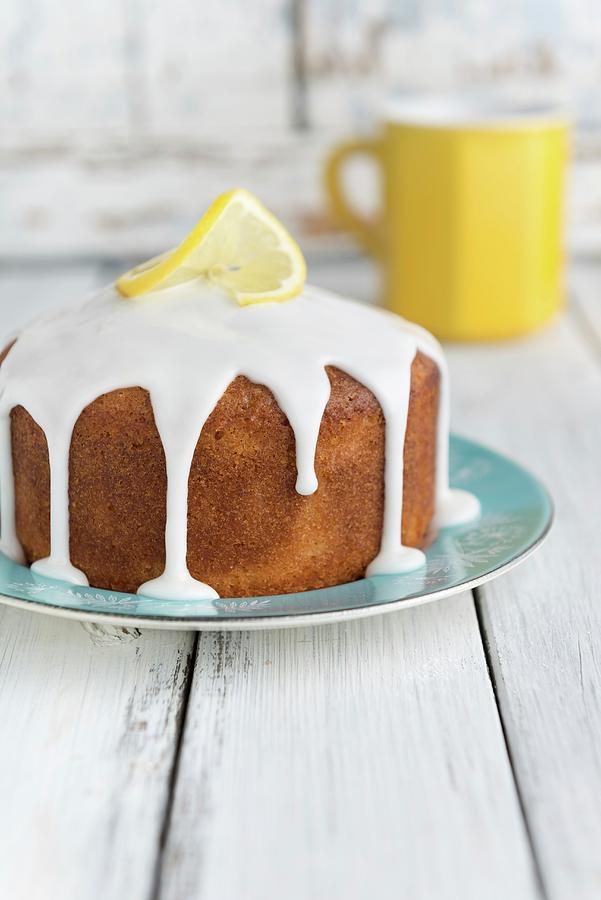 Vegan Lemon Drizzle Cake With Icing Photograph by Komar