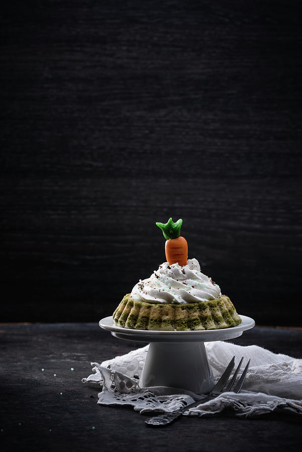 Vegan Matcha Vanilla Cake With A Marzipan Carrot Photograph by Kati Neudert