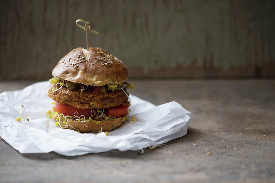 Vegan Millet Burger With Broccoli Sprouts On A Lye Bread Roll Photograph by Kati Neudert