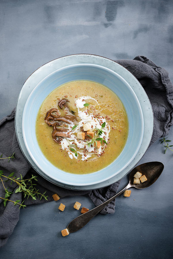 Vegan Mushroom And Potato Soup With Croutons And Linseed Photograph by Kati Neudert