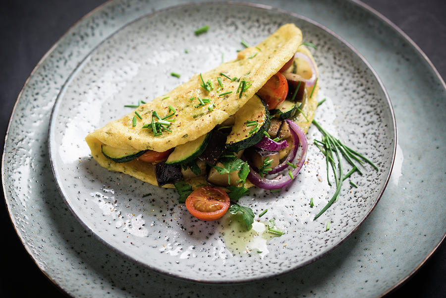 Vegan Omelette made From Yellow Mung Beans Filled With Courgette, Aubergines, Tomatoes And Red Onions Photograph by Kati Neudert