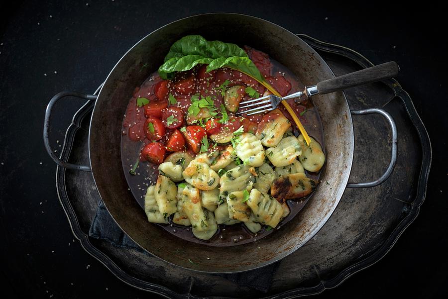 Vegan Pan-fried Swiss Chard Gnocchi With Tomato And Zucchini Sauce Photograph by Kati Neudert