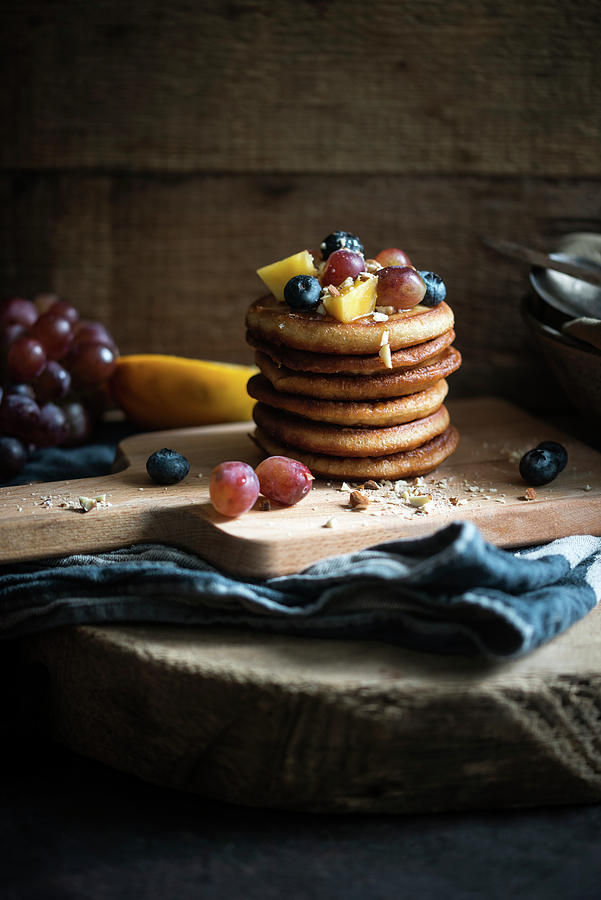 Vegan Pancakes With Rice Syrup, Fresh Fruit And Almonds Photograph by Kati Neudert