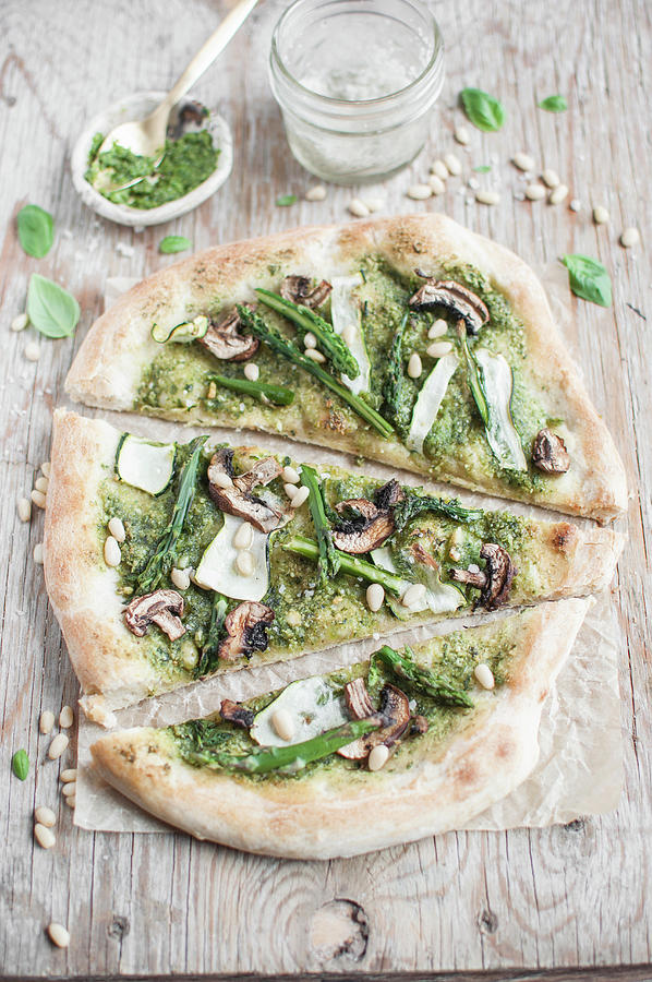Vegan Pizza With Pesto, Asparagus, Courgette, Mushrooms And Pine Nuts Photograph by Kachel Katarzyna