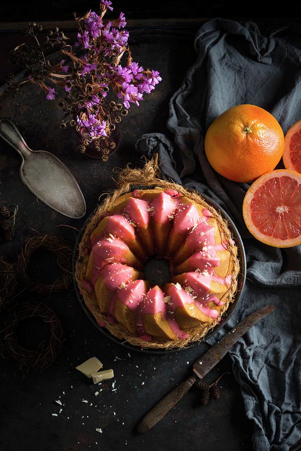 Vegan Ring-shaped Grapefruit Bundt Cake With White Rice Milk Chocolate Photograph by Kati Neudert