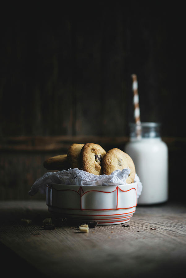 Vegan White Chocolate Biscuits With Dark Chocolate Chunks With A Bottle Of Almond Milk In The Background Photograph by Kati Neudert