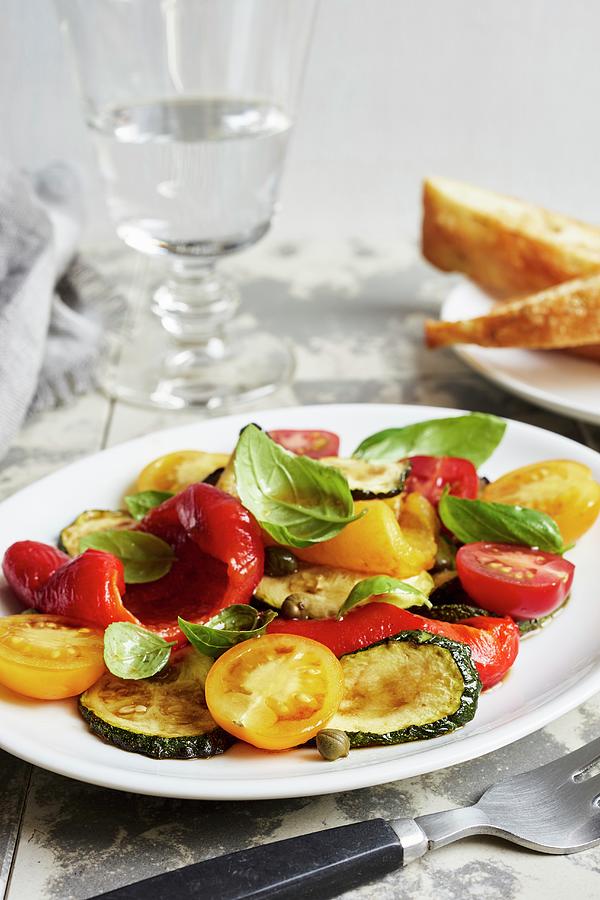 Vegetable Antipasti Salad With Basil Photograph by Ulrike Emmert