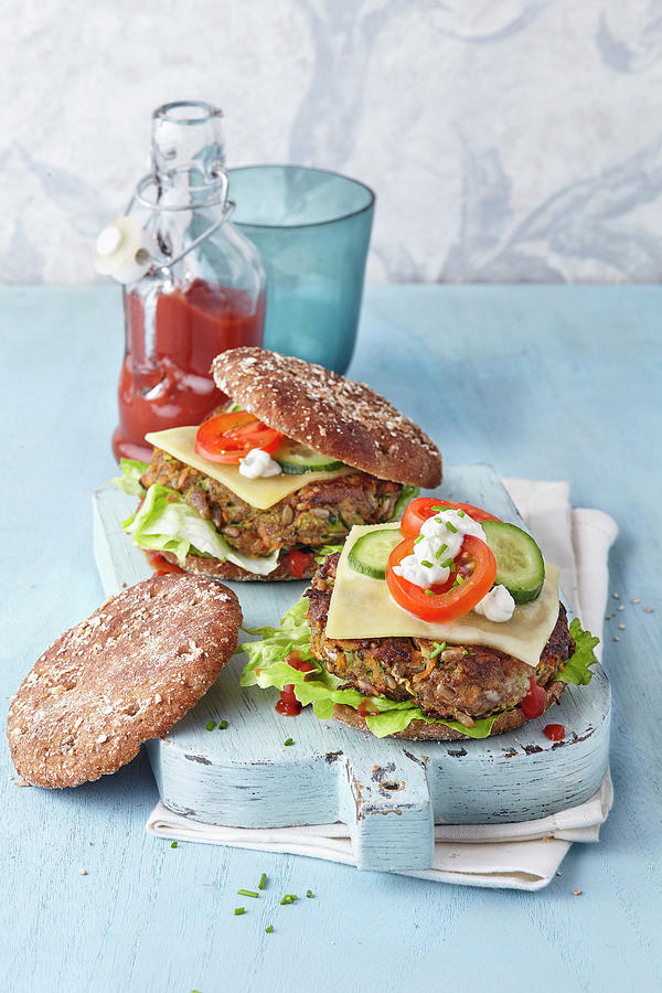 Vegetable Burgers With Cheese And Feta Cream Photograph by Giorgio Scarlini / Stockfood Studios