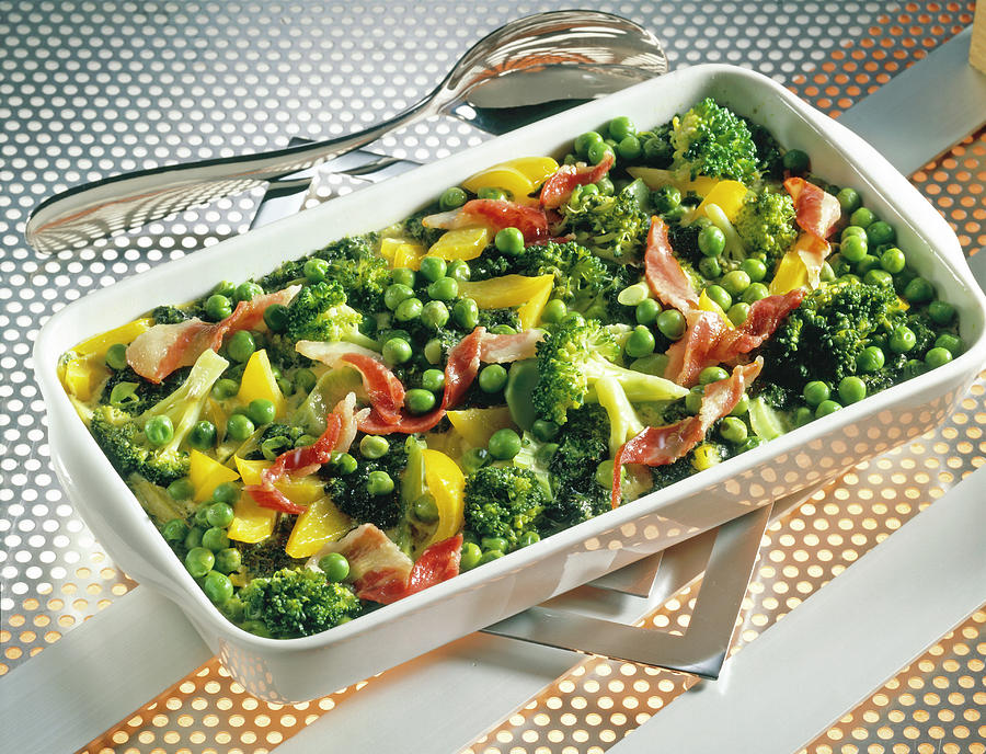 Vegetable Casserole With Spinach, Peas, Broccoli And Bacon In Serving Dish Photograph by Jalag / Uwe Bender