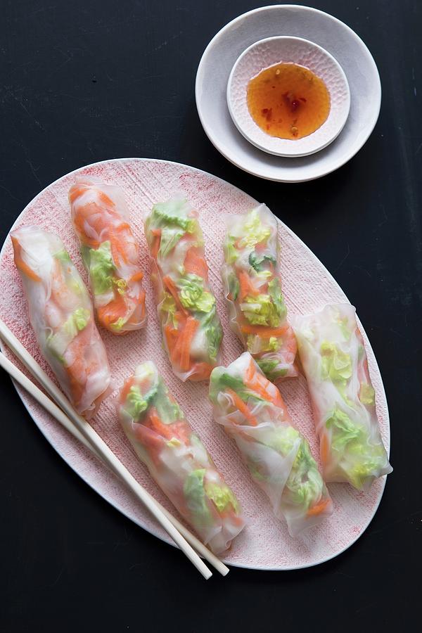 Vegetable-filled Spring Rolls With Spicy Chilli Sauce Photograph by Aniko Takacs