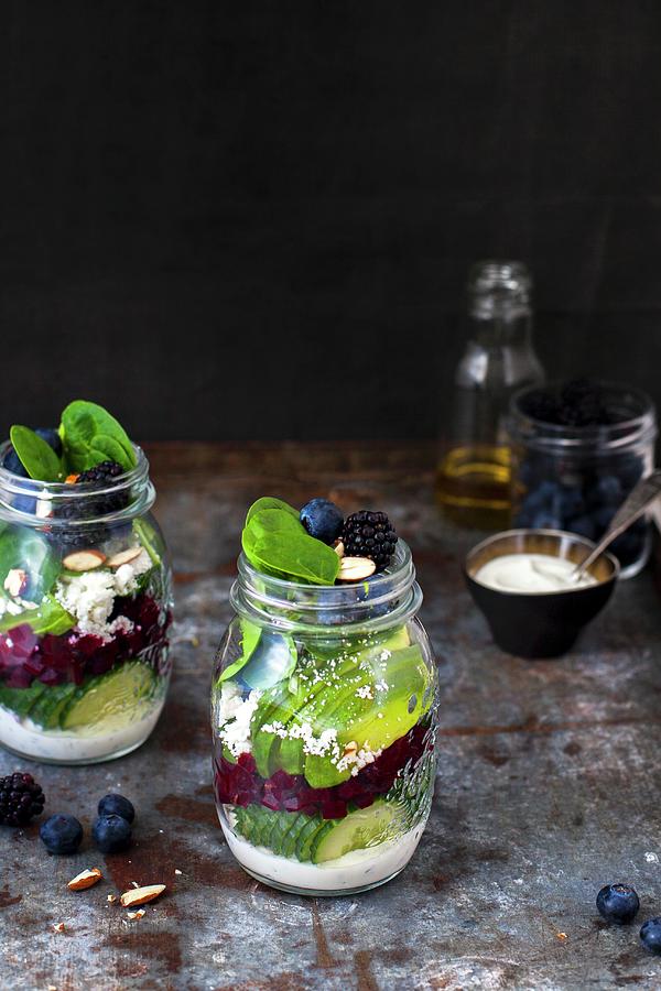 Vegetable Salads With Berries And Yoghurt Dressing In Glass Jars Photograph by Marleen Visser